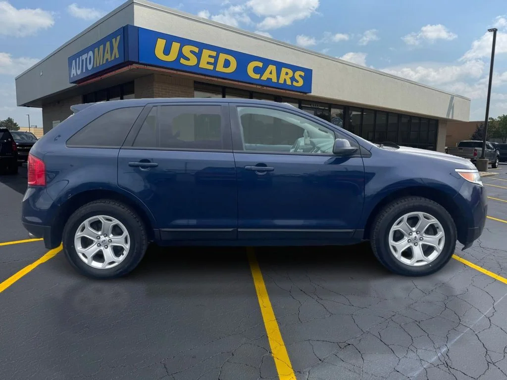 Used 2012 Ford Edge SEL with VIN 2FMDK4JCXCBA68669 for sale in Traverse City, MI