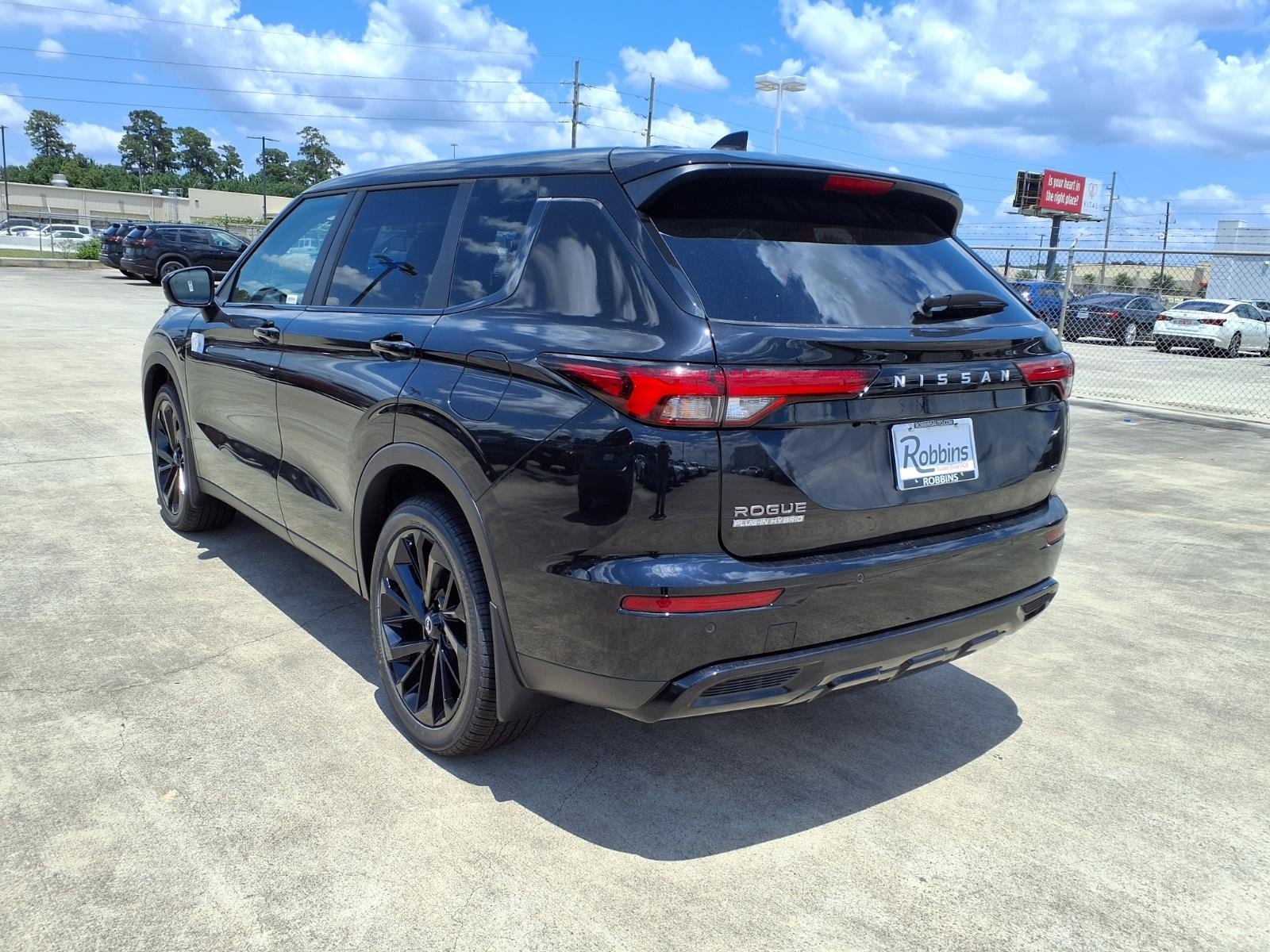 2026 Nissan Rogue Plug-In Hybrid SL Black at Sterling McCall Nissan