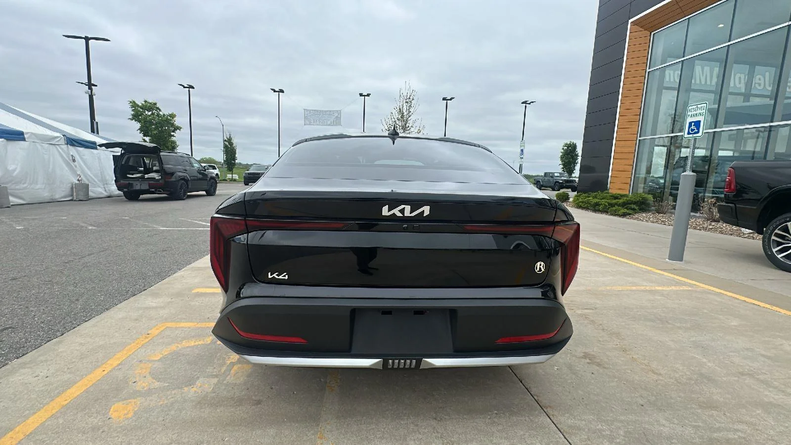 Used 2025 Aurora Black Pearl Kia LXS image 3