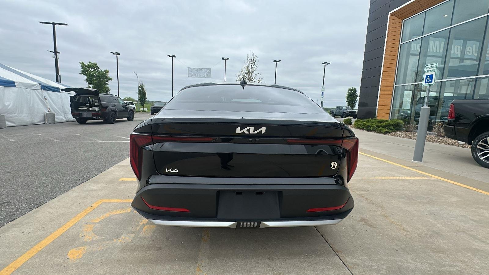 Used 2025 Aurora Black Pearl Kia LXS image 3