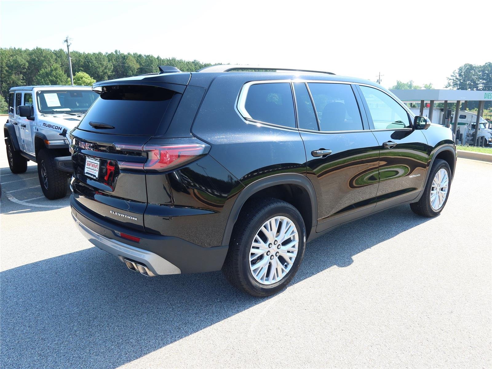 Used 2026 Ebony Twilight Metallic GMC FWD Elevation image 6