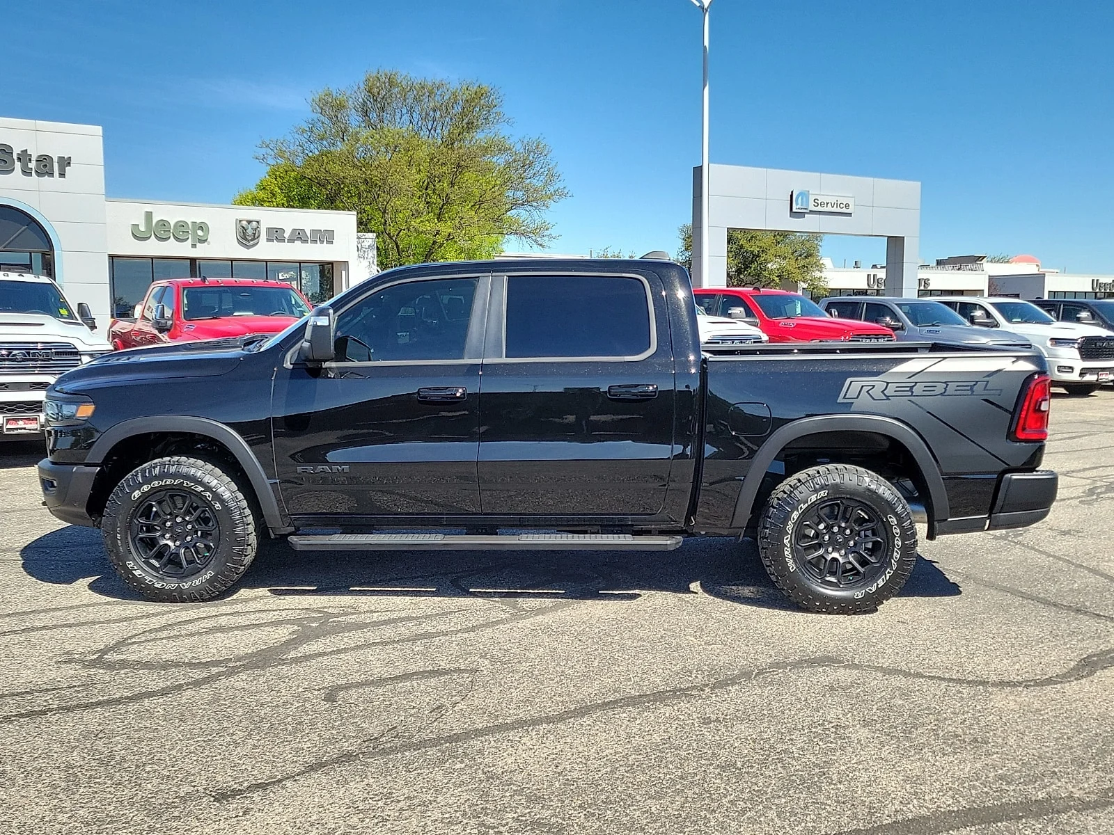 New 2026 Diamond Black Crystal Pearlcoat Ram REBEL CREW CAB 4X4 5