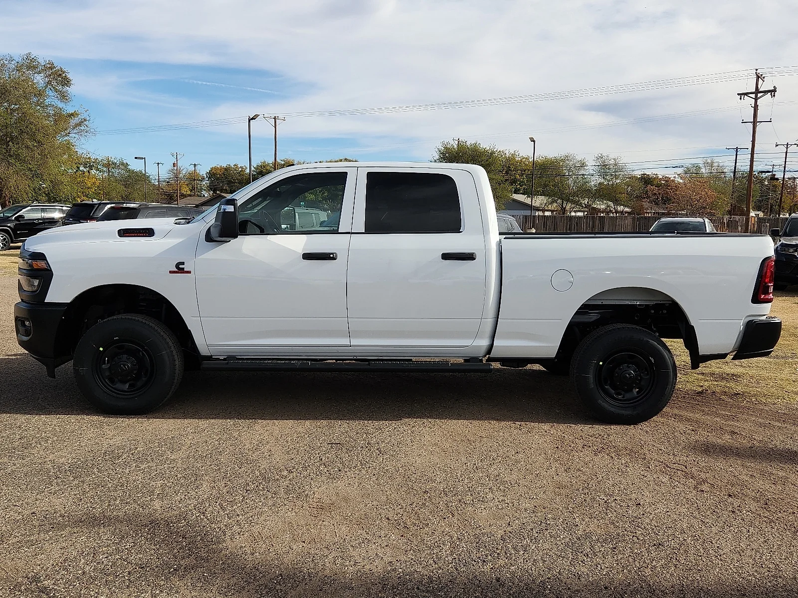 New 2026 PW7 Bright Whit Ram TRADESMAN CREW CAB 4X4 6