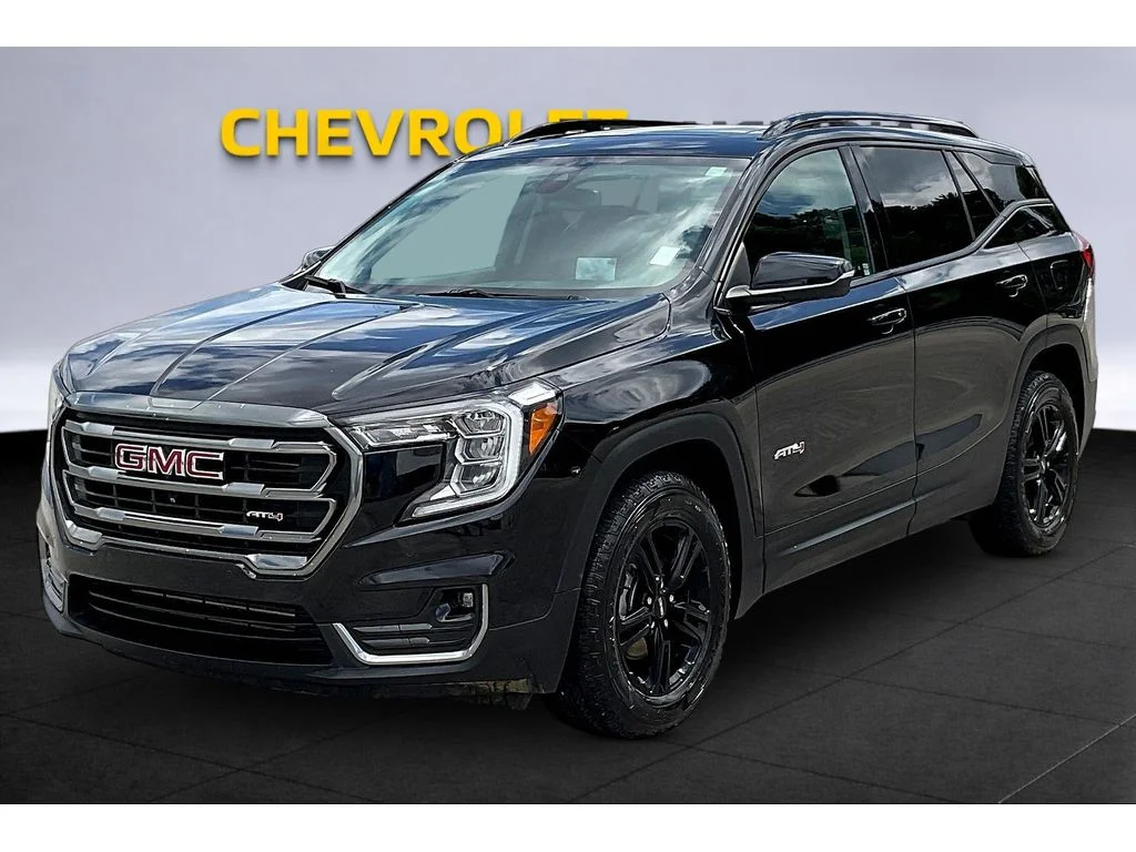 Used 2024 Ebony Twilight Metallic GMC AT4 image 9