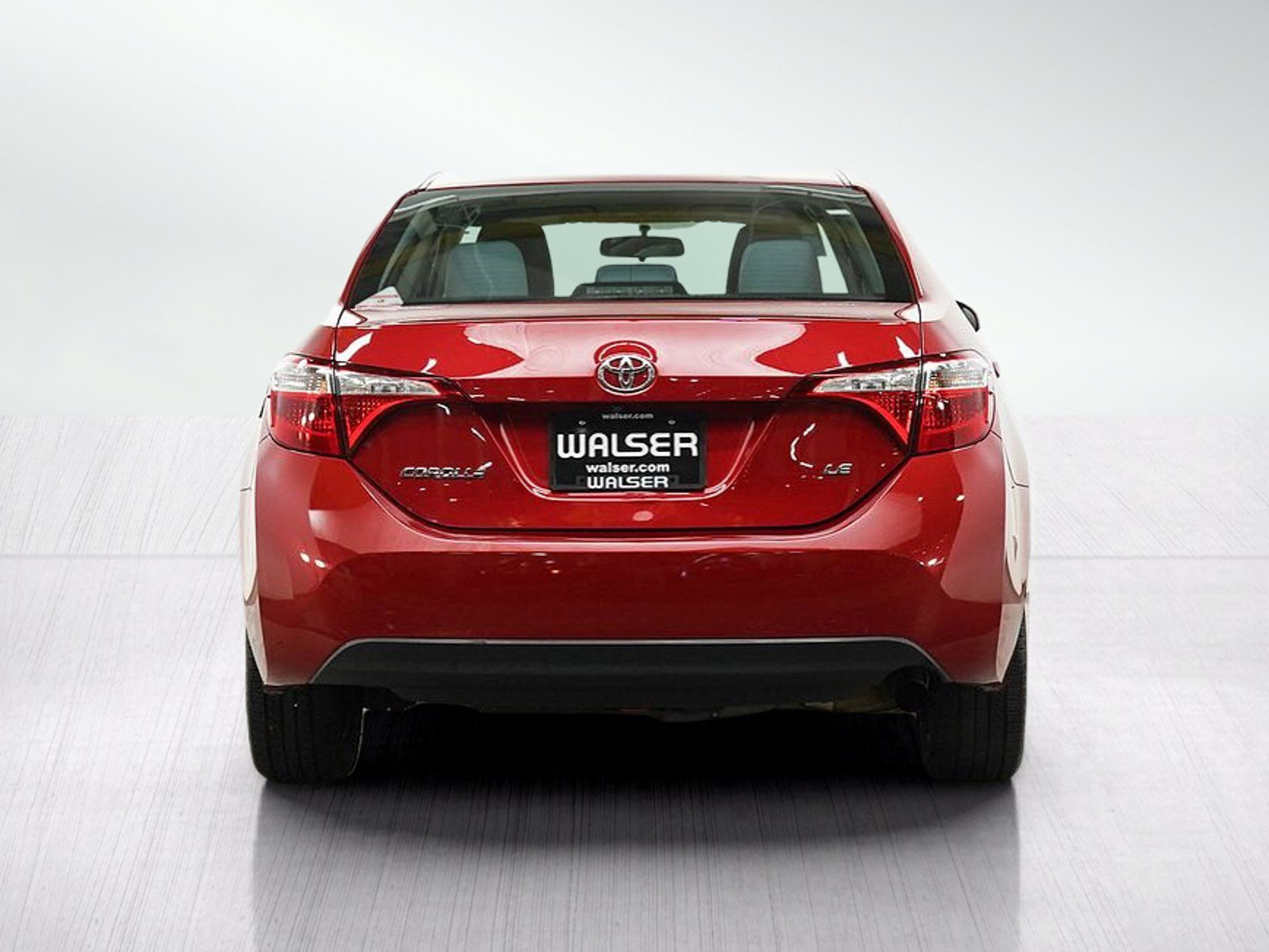 Used 2016 Barcelona Red Metallic Toyota LE image 4