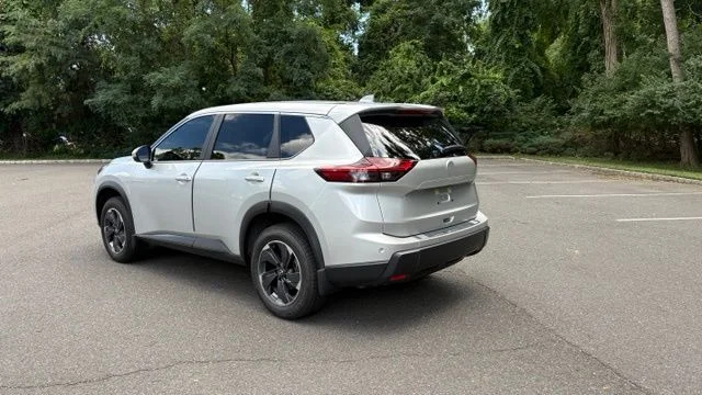 Used 2024 Brilliant Silver Metallic Nissan SV image 11