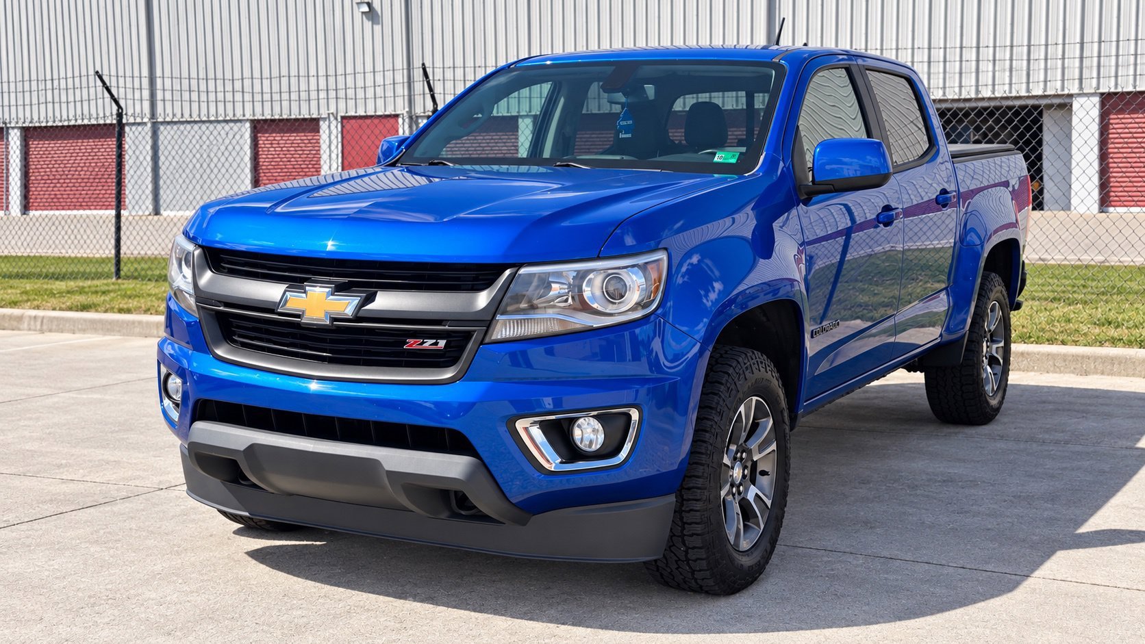Used 2020 Kinetic Blue Metallic Chevrolet Z71 image 1