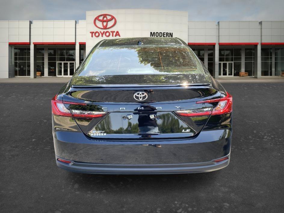 Used 2025 Midnight Black Metallic Toyota LE image 6
