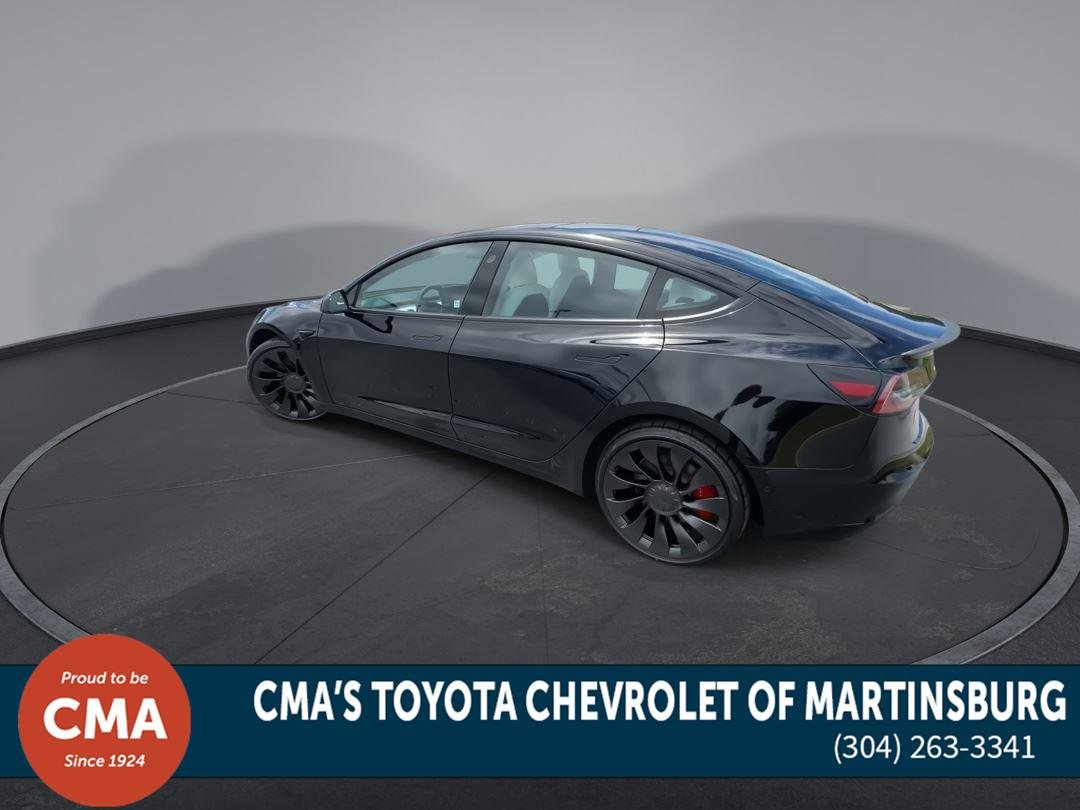 Used 2022 Solid Black Tesla Performance image 6