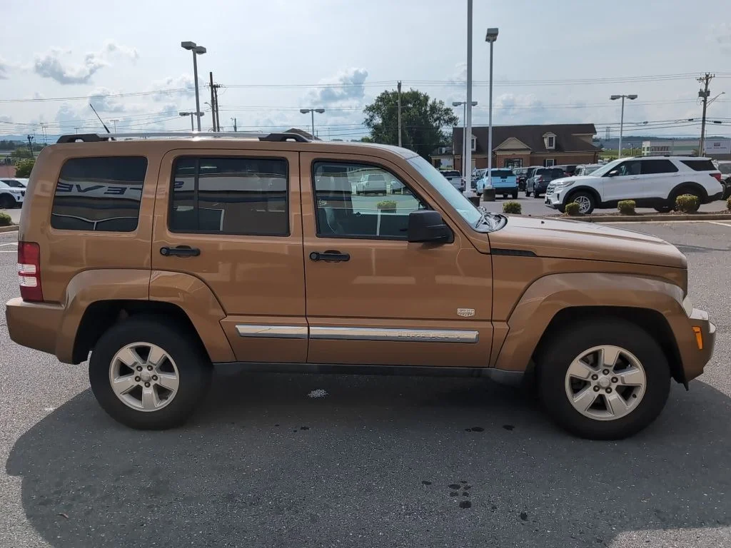 Used 2011 Brown Jeep Sport image 4