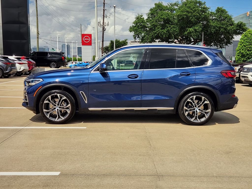 Used 2021 Blue Metallic BMW sDrive40i image 4