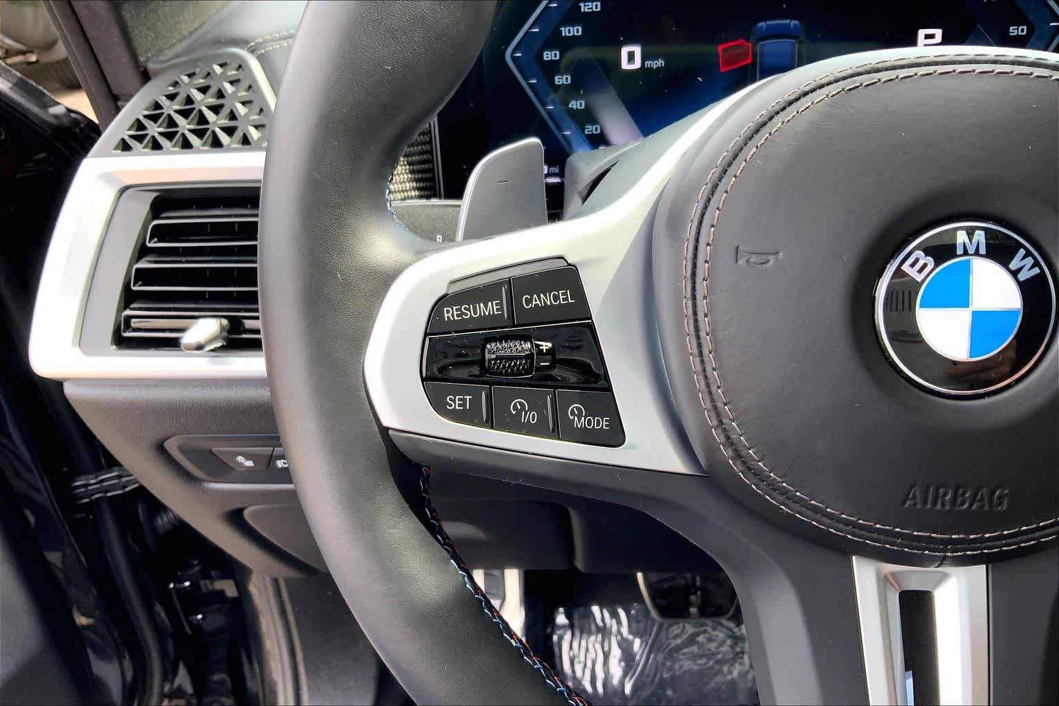 Used 2025 Black Sapphire Metallic BMW M60i image 23