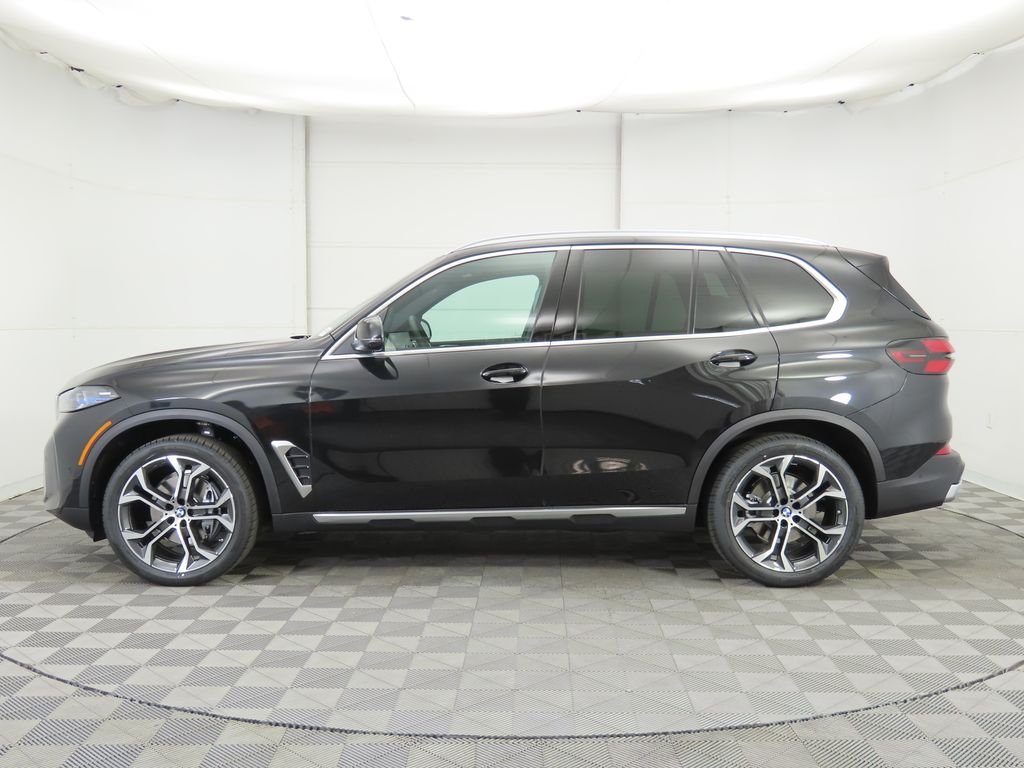 Certified Used 2026 Black Sapphire Metallic BMW sDrive40i image 9
