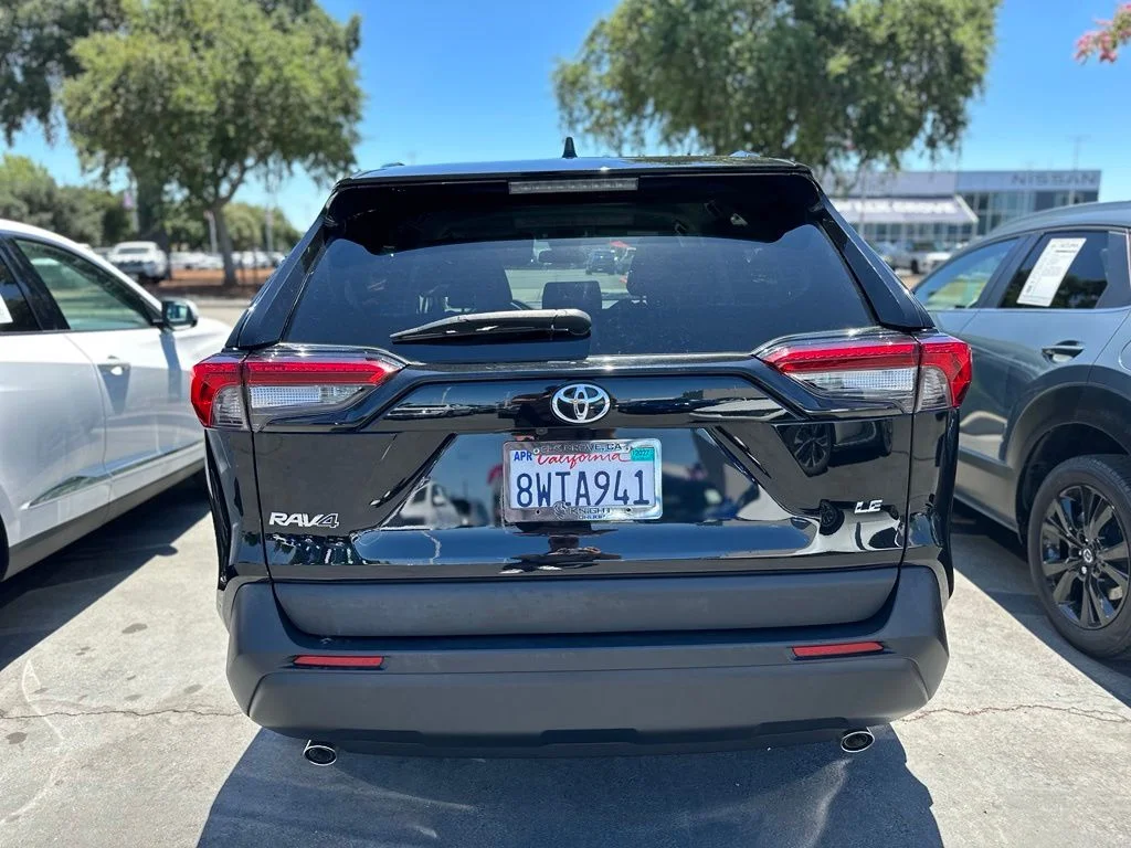 Used 2021 Midnight Black Metallic Toyota LE image 4