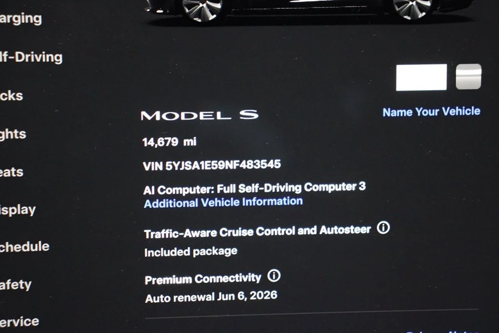 Used 2022 Solid Black Tesla Base image 21