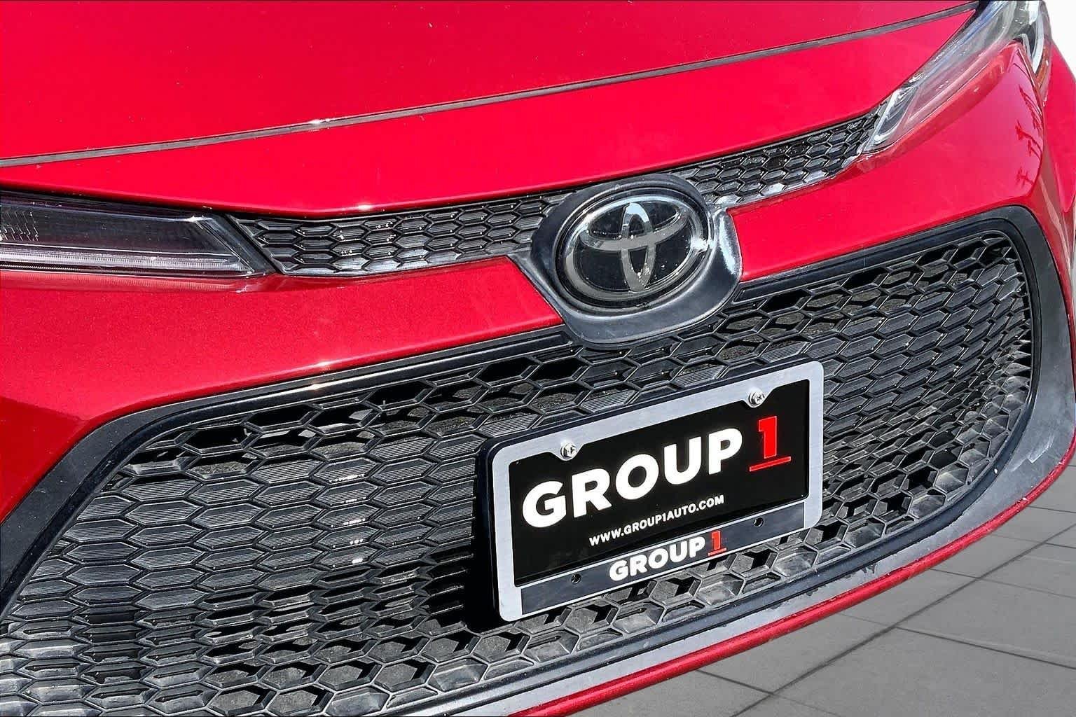Used 2021 Barcelona Red Metallic Toyota LE image 29