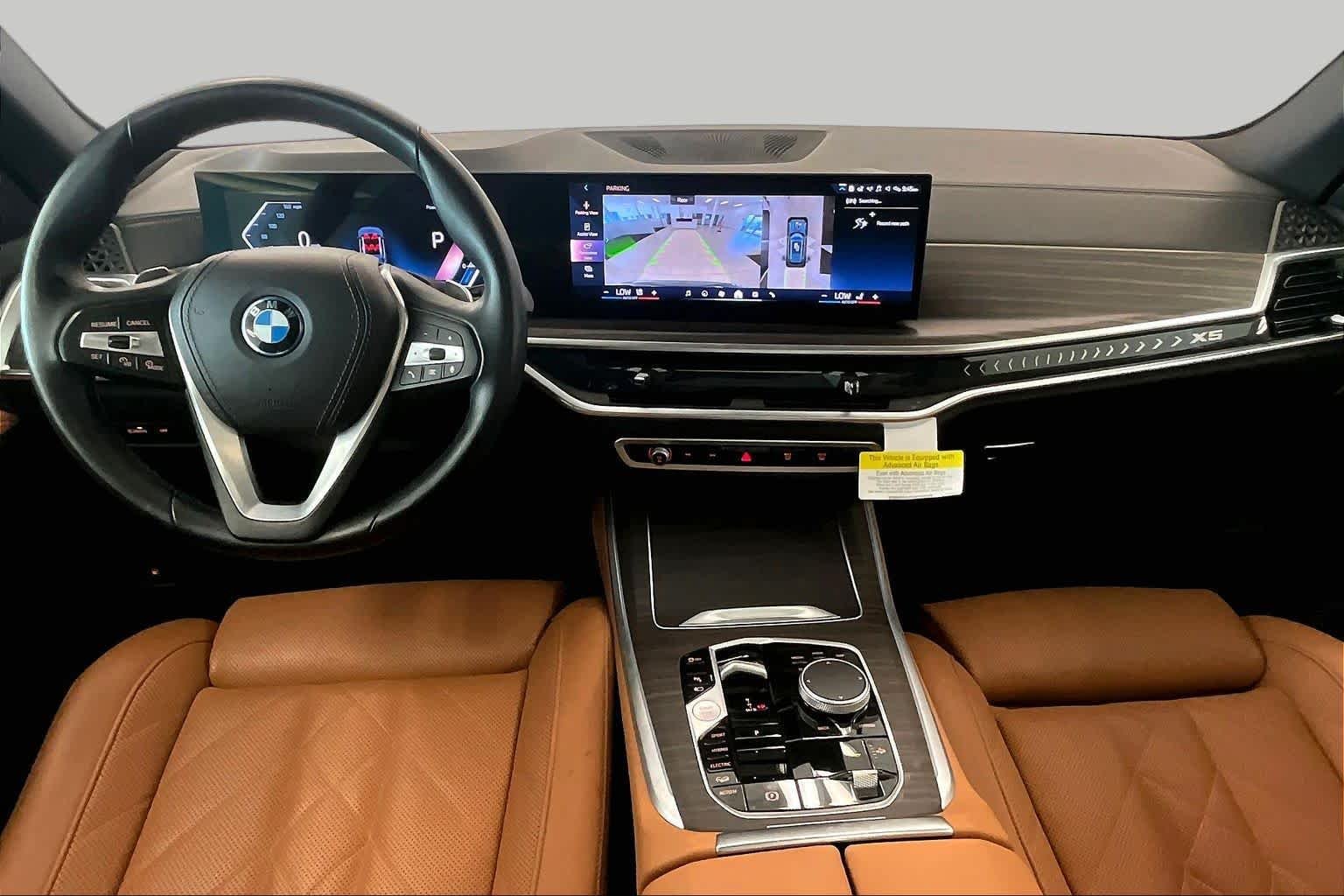 Used 2024 Blue Ridge Mountain Metallic BMW xDrive50e image 14