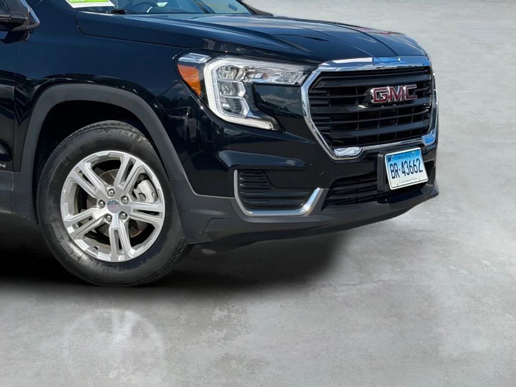 Used 2024 Ebony Twilight Metallic GMC SLE image 2