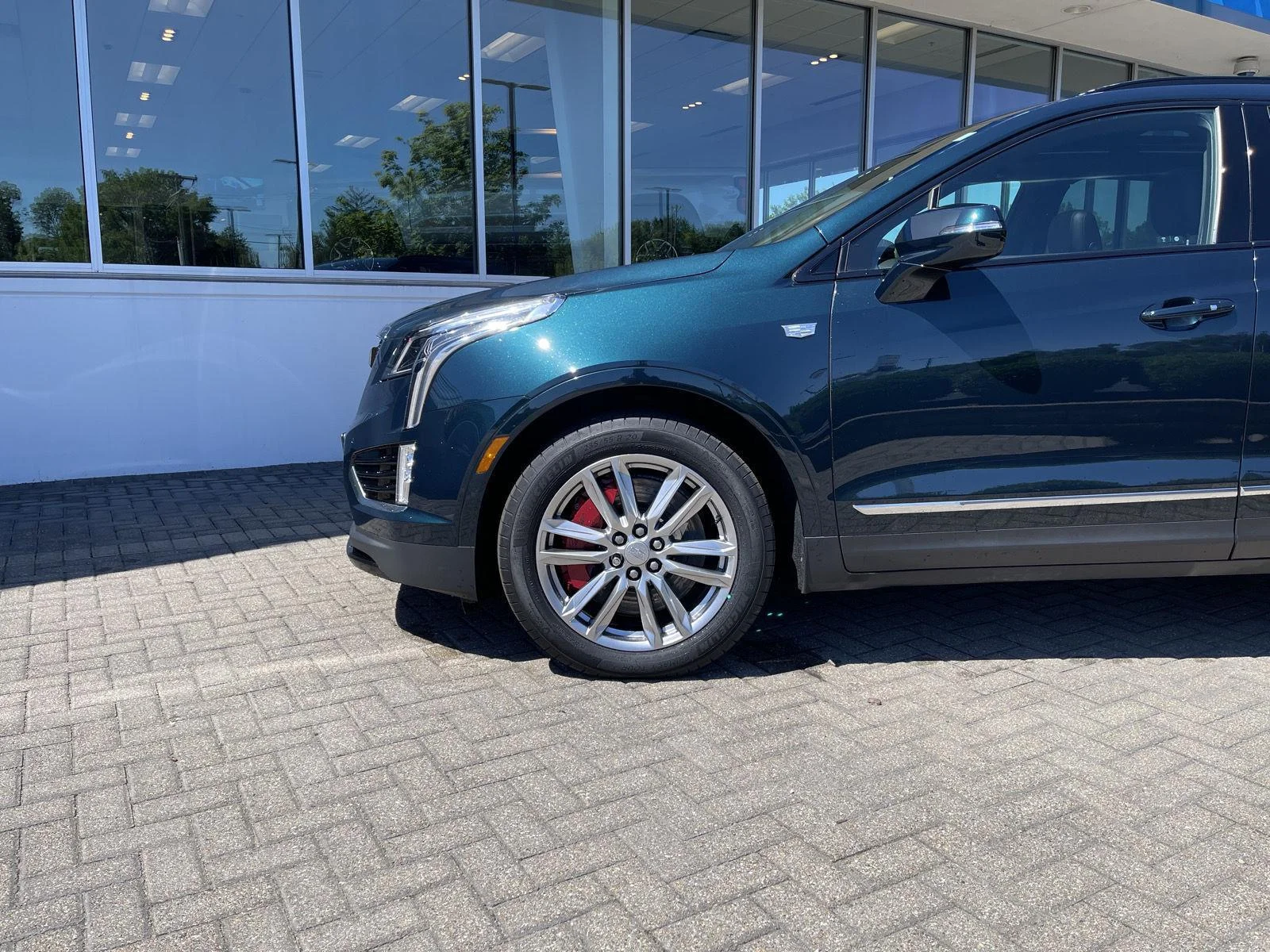 Used 2024 Emerald Lake Metallic Cadillac Sport image 9