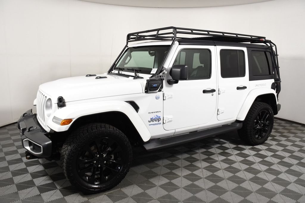 Used 2021 Jeep Wrangler Unlimited Sahara 4XE with VIN 1C4JJXP67MW788248 for sale in Richfield, Minnesota