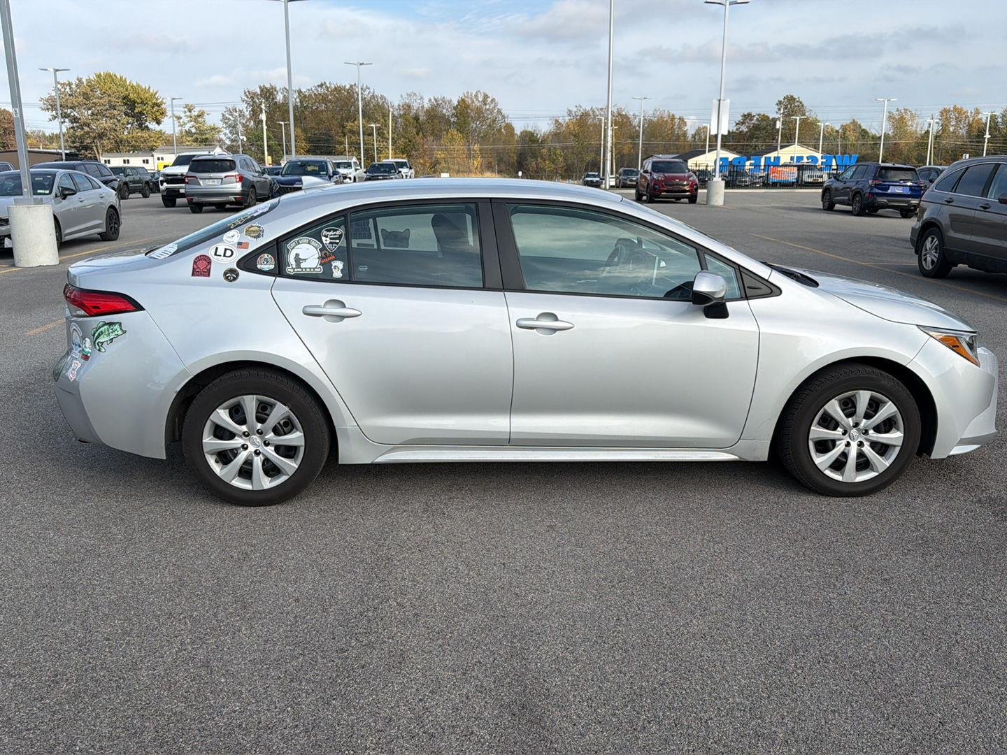 Used 2021 Classic Silver Metallic Toyota LE image 2