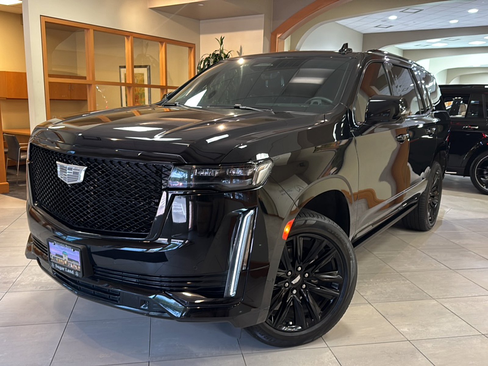 Used 2022 Black Raven Cadillac 4WD Sport Platinum image 1