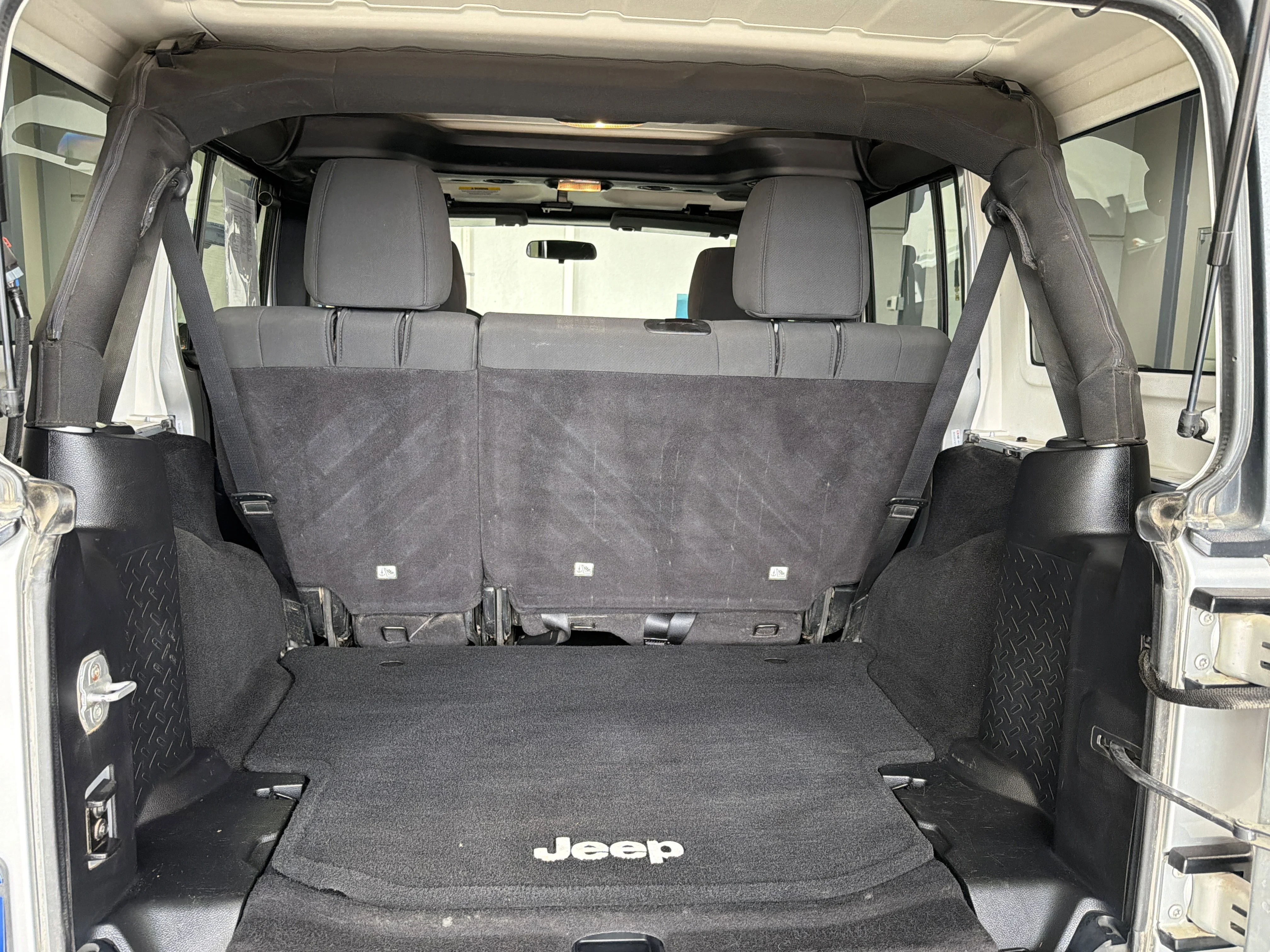Used 2012 Bright Silver Metallic Jeep Sport image 18