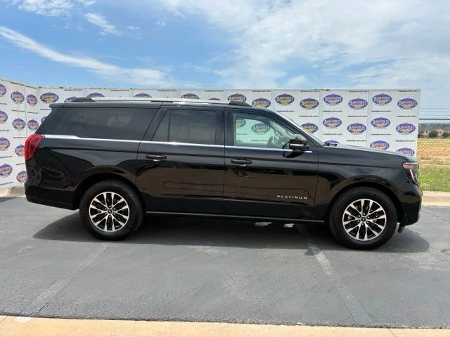 Used 2025 Black Metallic Ford Platinum image 1