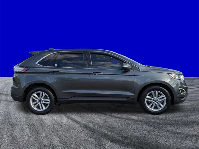 Used 2016 Magnetic Metallic Ford SEL image 3