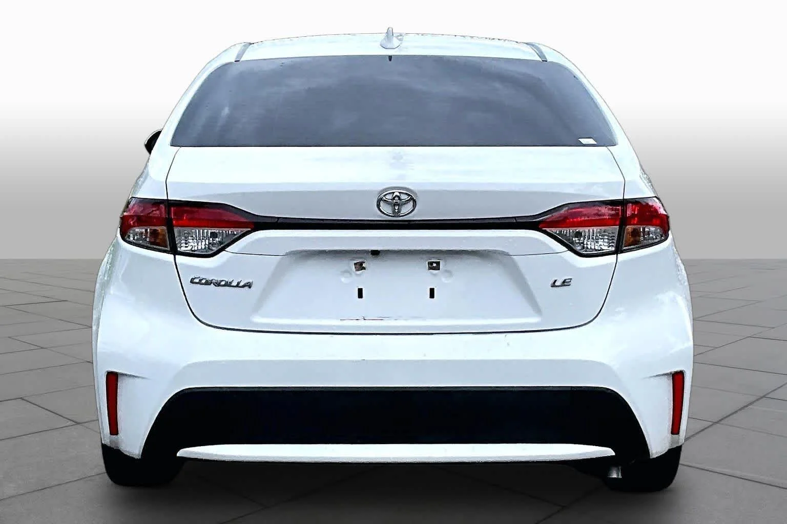 Used 2021 Super White Toyota LE image 5