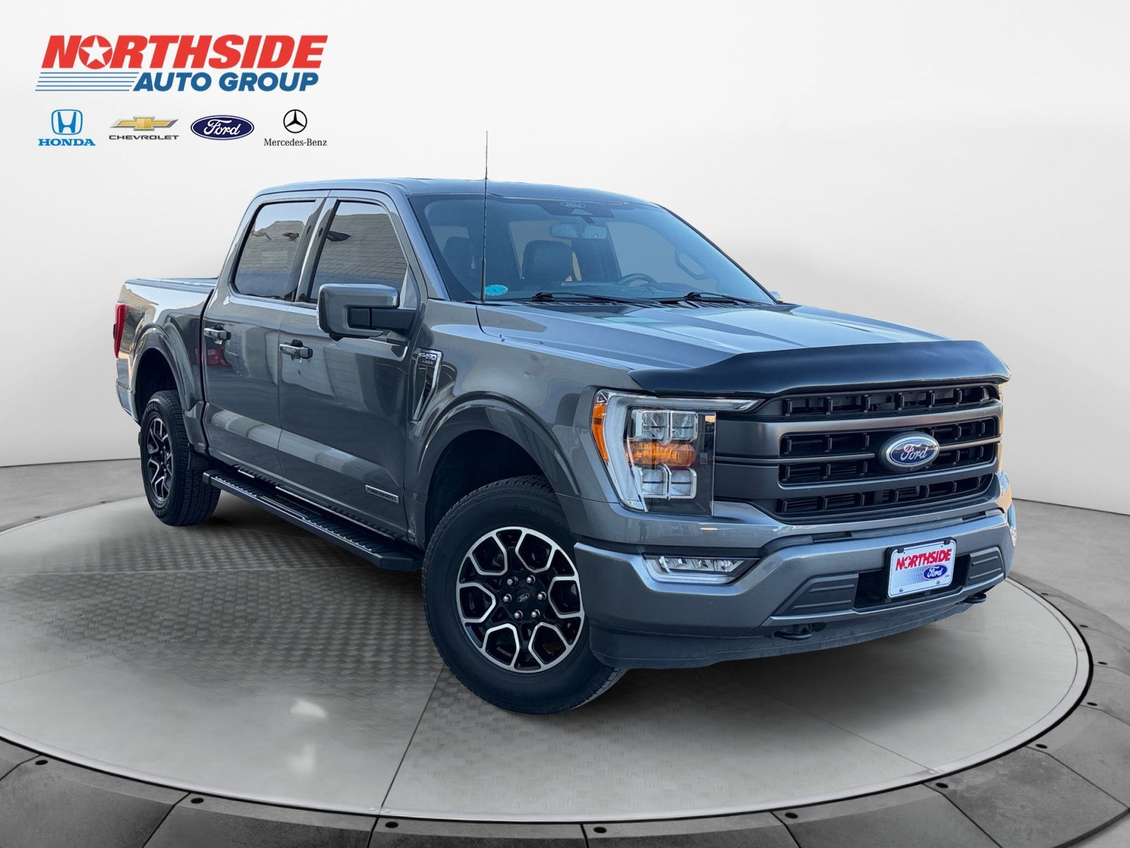Used 2022 Light Blue Clearcoat Metallic Ford LARIAT image 1