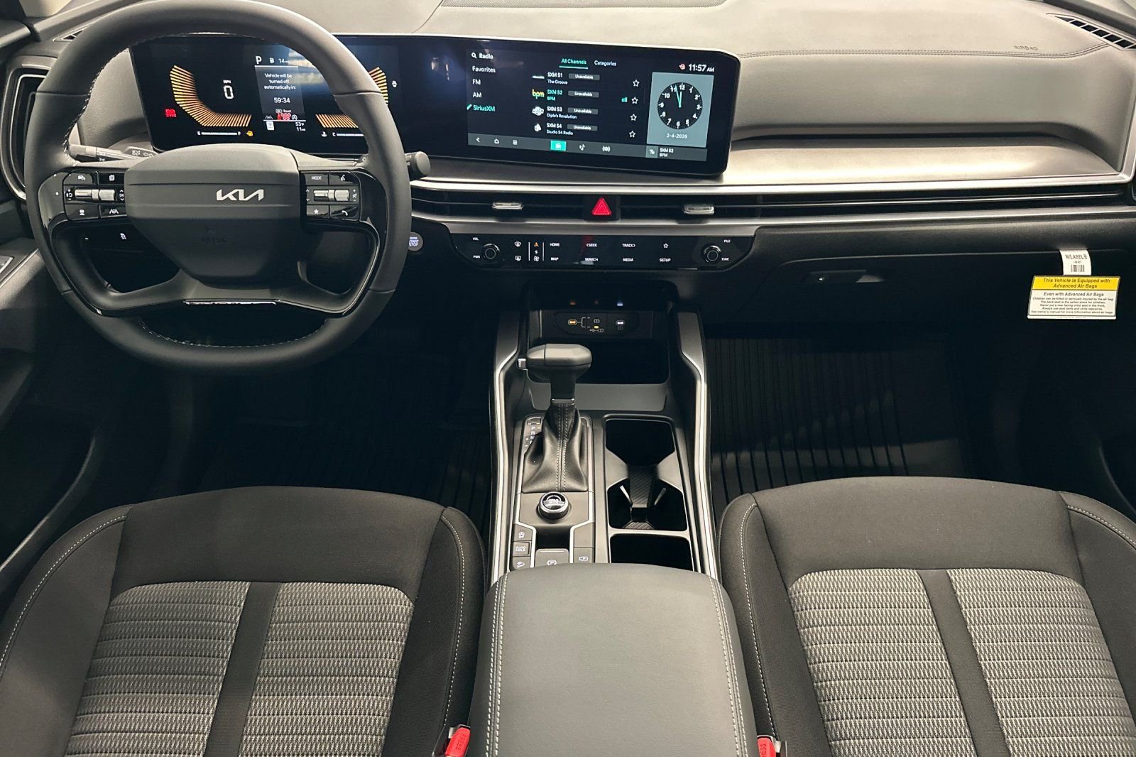 New 2026 Ivory Silver Kia LX image 9