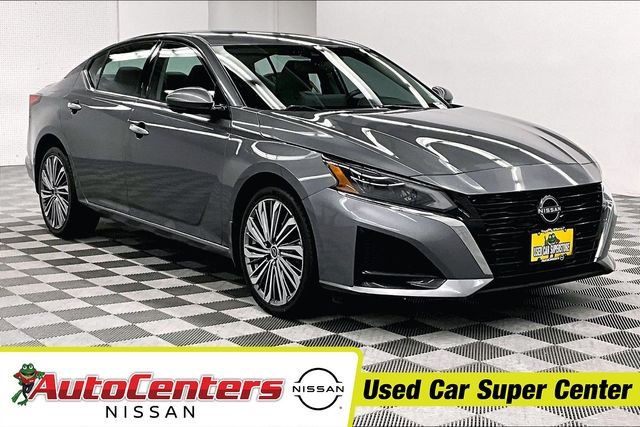 Used 2024 Gun Metallic Nissan Platinum image 1