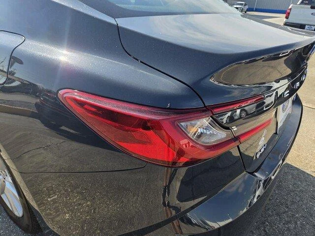 Used 2025 Midnight Black Metallic Toyota LE image 28