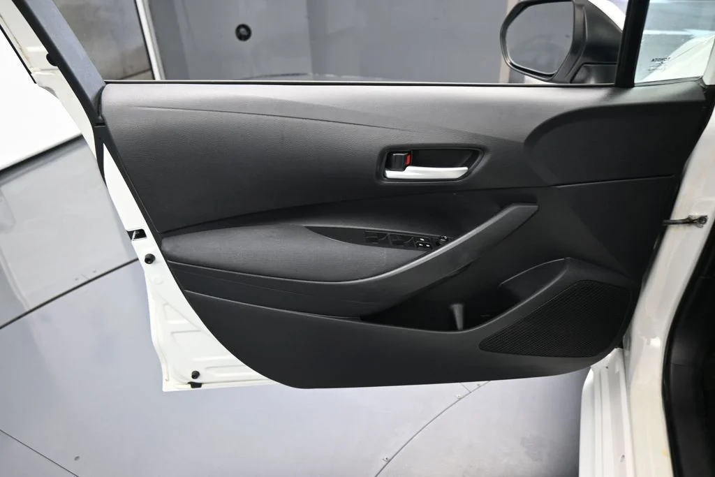 Used 2021 Super White Toyota LE image 11