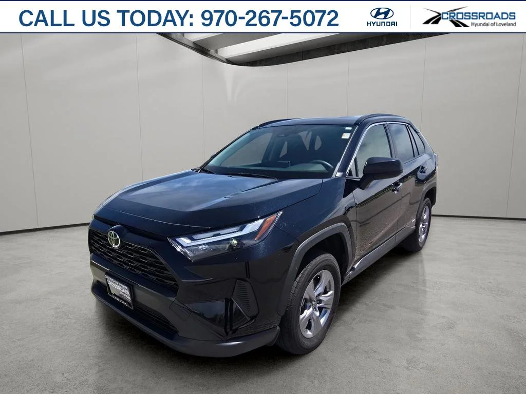 Used 2025 Midnight Black Metallic Toyota Hybrid LE image 1