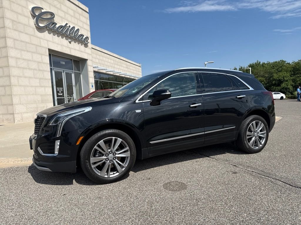 Used 2024 Black Cadillac Premium Luxury image 1