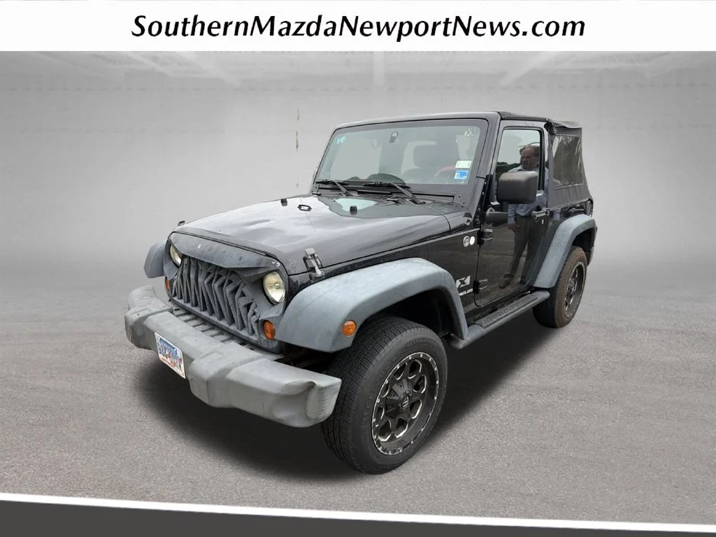 Used 2008 Black Jeep X image 1