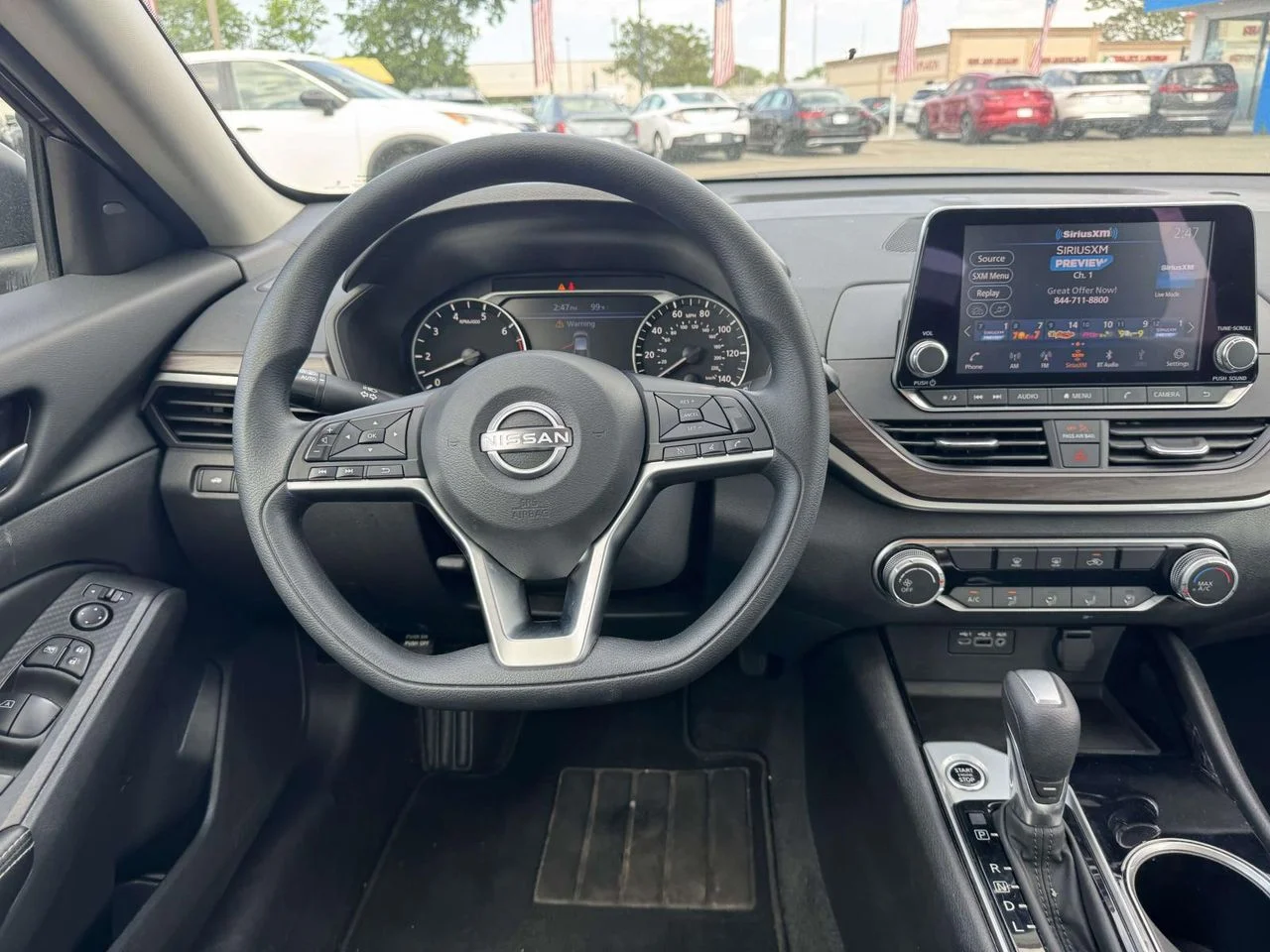 Used 2024 Garnet Pearl Metallic Nissan SV FWD image 17