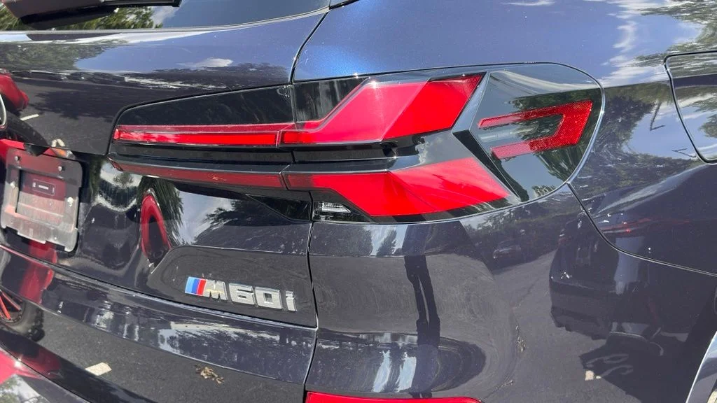 Used 2024 Black Sapphire Metallic BMW M60i image 7