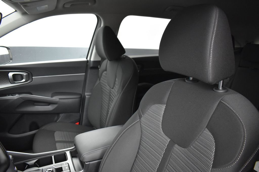 New 2026 Ivory Silver Kia LX image 9