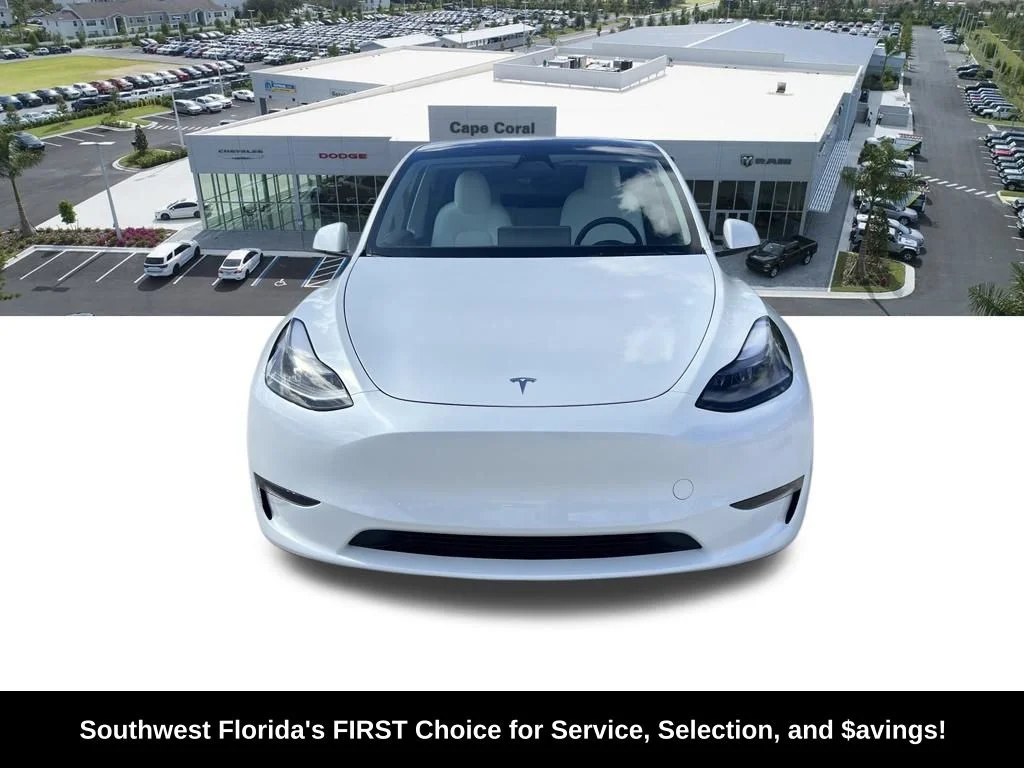 Used 2024 Tesla Model Y Long Range with VIN 7SAYGDEE3RA276164 for sale in Cape Coral, FL