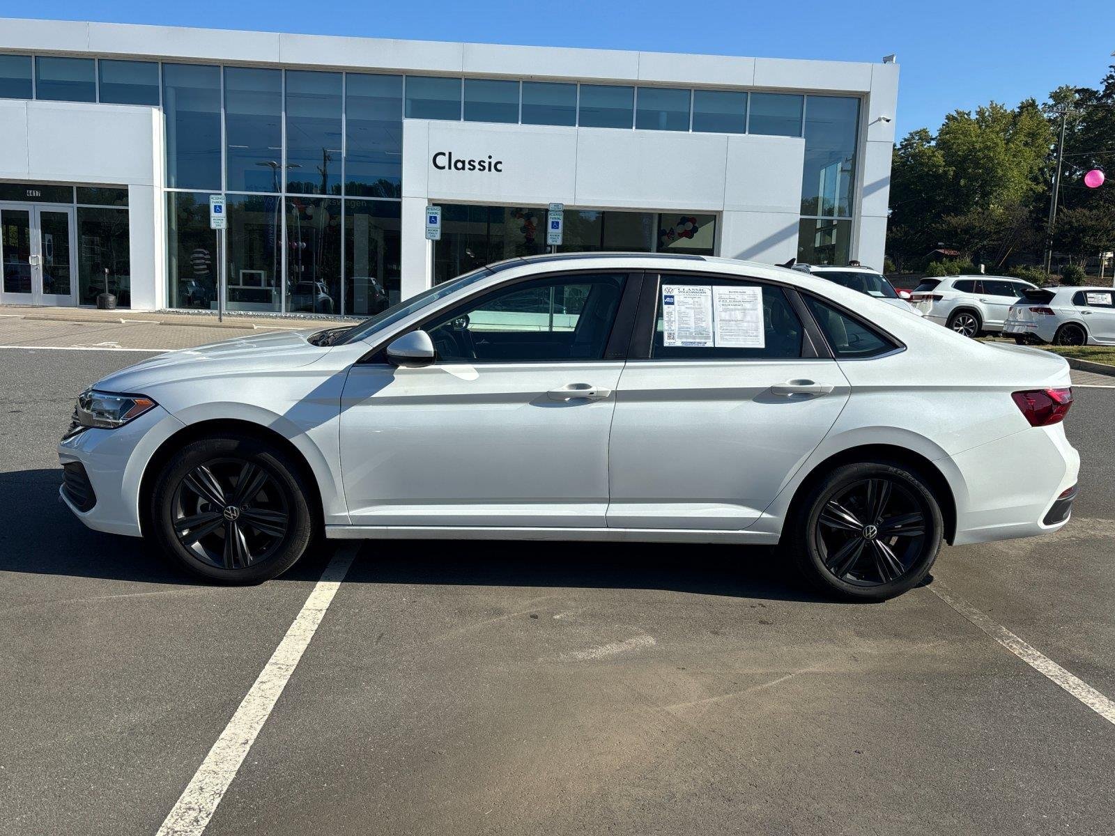 Used 2023 Opal White Pearl Volkswagen SE image 2