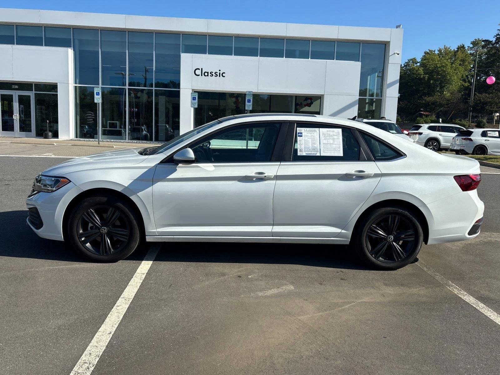 Certified Used 2023 Opal White Pearl Volkswagen SE image 2