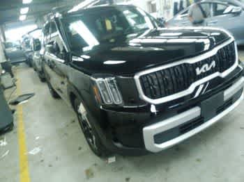 Used 2024 Ebony Black Kia EX image 2