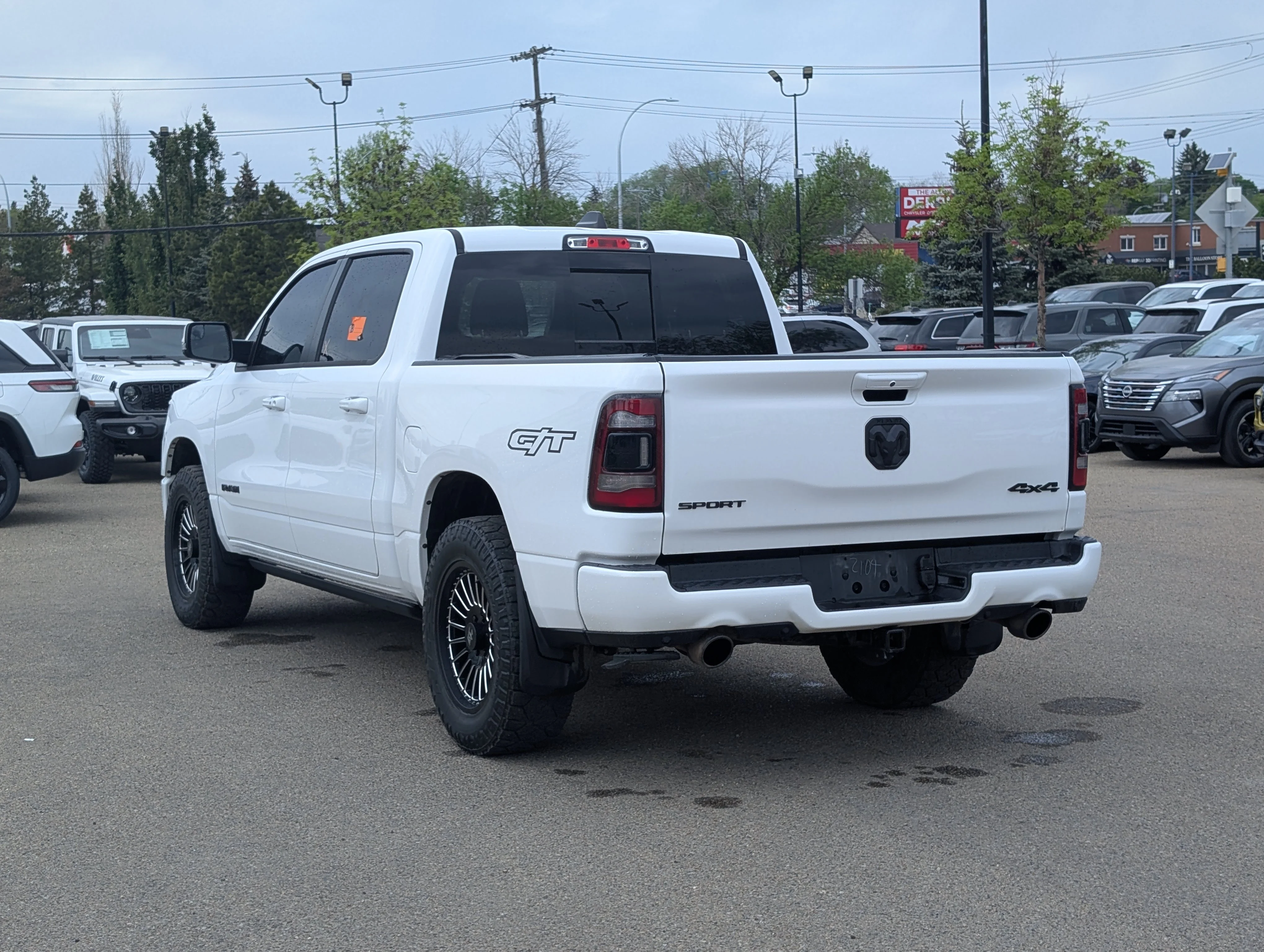 Used 2023 Bright White Ram Sport image 4