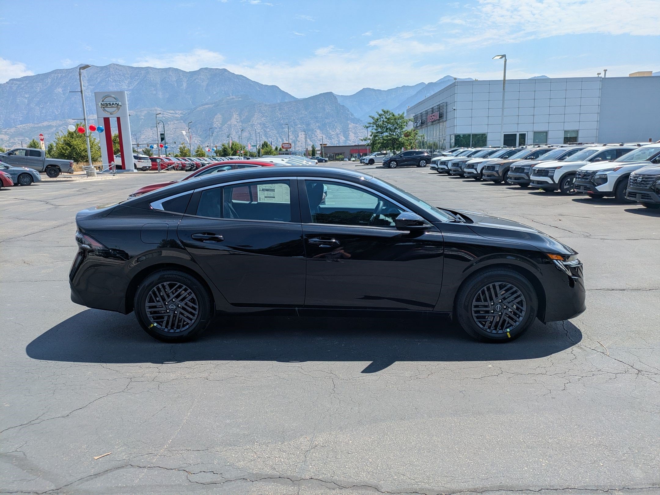 New 2026 Super Black Nissan SV image 2