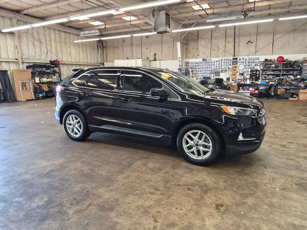 Certified Used 2022 Black Metallic Ford SEL image 1