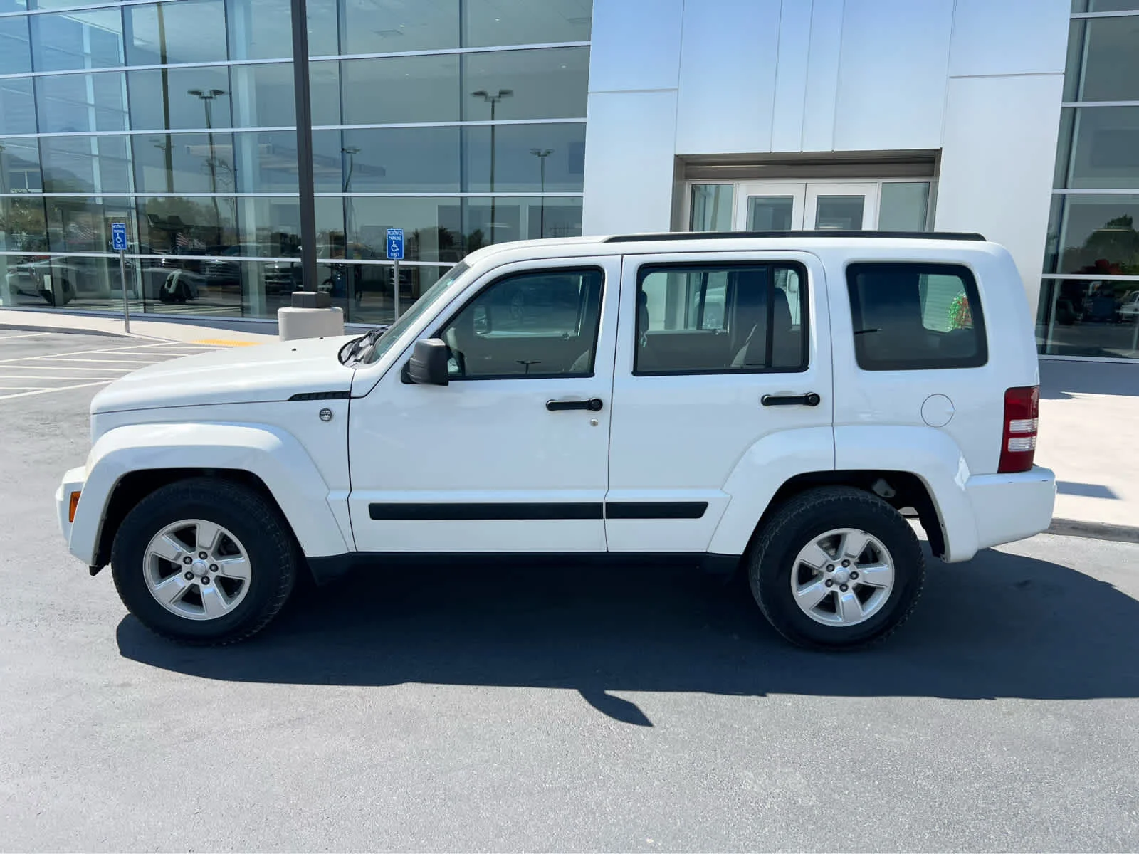 Used 2010 Stone White Clearcoat Jeep Sport image 12