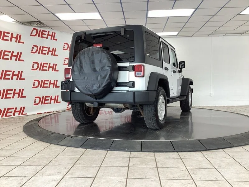 Used 2014 White Jeep Unlimited Sport image 7